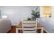 Charming dining area with a wooden table and seating, offering a glimpse of the inviting living room at 4570 Pinebrook Cir # 303, Bradenton, FL 34209