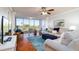 Spacious living room with large windows offering panoramic views at 4570 Pinebrook Cir # 303, Bradenton, FL 34209