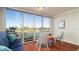 Bright living room featuring a sliding glass door and scenic water views at 4570 Pinebrook Cir # 303, Bradenton, FL 34209
