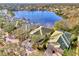 Aerial view highlighting the house with lake and surrounding neighborhood at 4914 Lakescene Pl, Sarasota, FL 34243