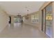 Open concept living room with lots of natural light at 4914 Lakescene Pl, Sarasota, FL 34243