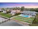 Waterfront homes each featuring private pools, docks, and impeccably landscaped yards at 7416 Riverview Dr, Bradenton, FL 34209