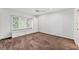 Spacious bedroom with natural light, featuring a window seat and built-in storage at 7416 Riverview Dr, Bradenton, FL 34209