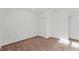 Clean bedroom with neutral paint and closet at 7416 Riverview Dr, Bradenton, FL 34209