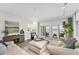 Bright living area with sliding glass doors to outdoor patio and open layout to dining area at 7416 Riverview Dr, Bradenton, FL 34209