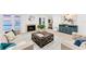 Inviting living room with fireplace, lake views, and stylish decor for relaxed living at 7416 Riverview Dr, Bradenton, FL 34209