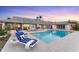 Home exterior with a pool and outdoor seating at 7416 Riverview Dr, Bradenton, FL 34209