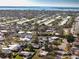 Aerial view of a residential neighborhood showcasing the home's location near the water at 807 62Nd W St, Bradenton, FL 34209