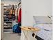 Bedroom featuring a closet with shelving for shoes, hats, bags, and clothing at 807 62Nd W St, Bradenton, FL 34209
