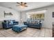 Bright and airy living room with matching sofas and a large window letting in natural light at 807 62Nd W St, Bradenton, FL 34209