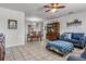 Open living area with tile floors leading to the dining area, creating an inviting space at 807 62Nd W St, Bradenton, FL 34209