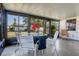 Enclosed patio with seating, perfect for enjoying the outdoors in a comfortable, screened-in space at 807 62Nd W St, Bradenton, FL 34209