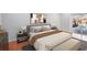 This bedroom features a large bed, wood floors, and sliding glass doors to the pool at 8818 29Th E St, Parrish, FL 34219