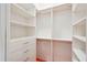 The closet has built in shelving and drawers for maximum storage capabilities at 8818 29Th E St, Parrish, FL 34219