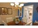 Cozy dining room with wooden table and decorative accents at 3756 Lake Bayshore # 509, Bradenton, FL 34205