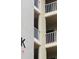 A side view of the building featuring multiple balconies with white railings at 3756 Lake Bayshore # 509, Bradenton, FL 34205