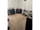 This bedroom has carpet, a desk, and various items, offering a cozy and functional space at 10923 Blue Magnolia Ln, Parrish, FL 34219