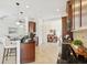 Open-concept kitchen layout with stainless steel appliances and a convenient breakfast bar at 14614 Newtonmore Ln, Lakewood Ranch, FL 34202