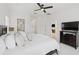 Main bedroom with a view to other living areas and television at 14614 Newtonmore Ln, Lakewood Ranch, FL 34202