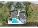 Overhead view of the community pool, spa, patio, and clubhouse near the bay at 25 Tidy Island Blvd, Bradenton, FL 34210