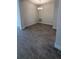 Dining room with wood-look tile flooring and a modern chandelier at 2640 Averland Loop, North Port, FL 34287