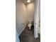 Small half bathroom with toilet and vanity at 2640 Averland Loop, North Port, FL 34287