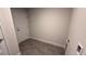 Functional laundry room with tile floors and hookups for modern appliances at 2640 Averland Loop, North Port, FL 34287