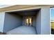 Covered outdoor patio offers an enjoyable space for outdoor relaxation and dining at 2640 Averland Loop, North Port, FL 34287
