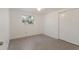 Bedroom featuring natural light, closet, and neutral walls at 3395 Hardee Dr, Venice, FL 34292