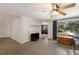 Living room boasts sleek floors and seamlessly connects to other spaces at 3395 Hardee Dr, Venice, FL 34292