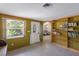 Room with doorway leading to living room and bookshelf at 3395 Hardee Dr, Venice, FL 34292