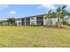 Beautiful two-story condo with screened lanais and a spacious green lawn at 6705 Grand Estuary Trl # 201, Bradenton, FL 34212
