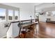 Landing area features a desk workspace, bright windows with water views, and access to the bedroom at 6821 Longboat S Dr, Longboat Key, FL 34228
