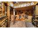Rustic wine cellar featuring wooden racks and a diverse collection of wines at 6821 Longboat S Dr, Longboat Key, FL 34228