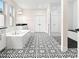 Elegant bathroom featuring a soaking tub, glass-enclosed shower, and stylish black-and-white patterned tile floors at 1012 Fernleaf Run, Bradenton, FL 34212