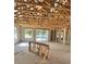 Interior view highlighting the construction phase and open layout with slider to patio at 19591 Fort King Run, Brooksville, FL 34601