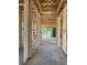 Spacious interior view showcasing the construction framework, open layout, and natural light at 19591 Fort King Run, Brooksville, FL 34601