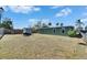 This large backyard has a green house and partially fenced in yard at 2203 18Th Street E Ct, Bradenton, FL 34208