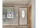 Home entryway featuring a decorative door, window, and closet providing ample natural light at 2203 18Th Street E Ct, Bradenton, FL 34208