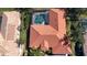 Aerial view of the house, showing the backyard and the waterfront view at 3716 Eagle Hammock Dr, Sarasota, FL 34240