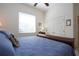 Inviting bedroom with vaulted ceiling, a large window, and closet space at 3716 Eagle Hammock Dr, Sarasota, FL 34240