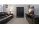 This living room offers a comfortable seating area and a wall-mounted TV at 3716 Eagle Hammock Dr, Sarasota, FL 34240