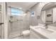 Modern bathroom featuring a glass-enclosed shower, sleek vanity, and contemporary fixtures, creating a spa-like feel at 4350 Chatham Dr # 208, Longboat Key, FL 34228