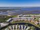 Aerial view showcasing the property's location near the water and surrounding community at 4714 Potomac Cir, Bradenton, FL 34210