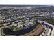 Expansive aerial view of canal-front homes in a desirable waterfront community with easy access to the open sea at 4714 Potomac Cir, Bradenton, FL 34210
