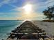 Unique perspective of the beach with railway and the ocean's edge merging in the distance at 4714 Potomac Cir, Bradenton, FL 34210