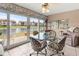 Dining area with waterfront view and sliding glass doors to the outside at 4714 Potomac Cir, Bradenton, FL 34210