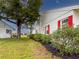 Well-maintained home with red shutters and neat landscaping, offering great curb appeal at 4714 Potomac Cir, Bradenton, FL 34210