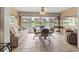 Comfortable seating in a bright living room with a beautiful view of the waterfront at 4714 Potomac Cir, Bradenton, FL 34210