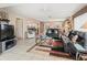 Open-concept design with tile flooring, comfortable seating, and natural light throughout the living spaces at 4714 Potomac Cir, Bradenton, FL 34210